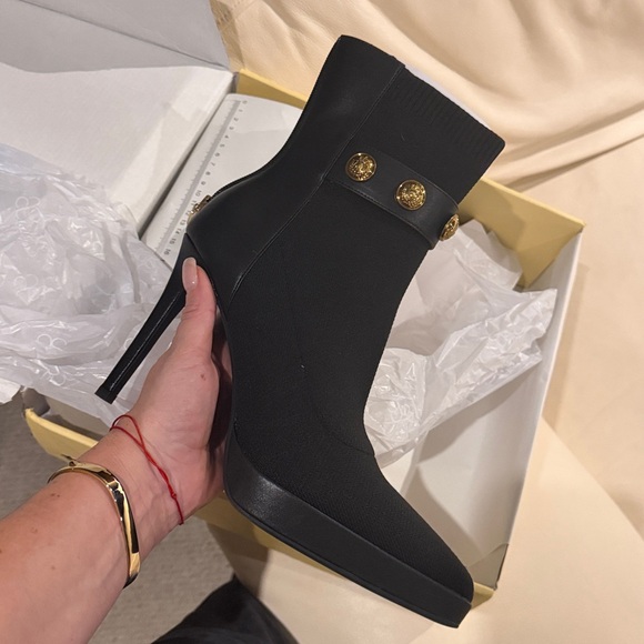 Chic Black Heeled Ankle Boots with Gold Accents - Picture 7 of 8